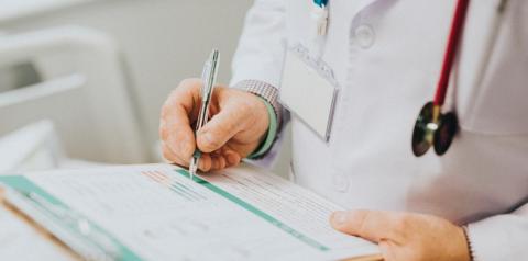 doctor with clipboard